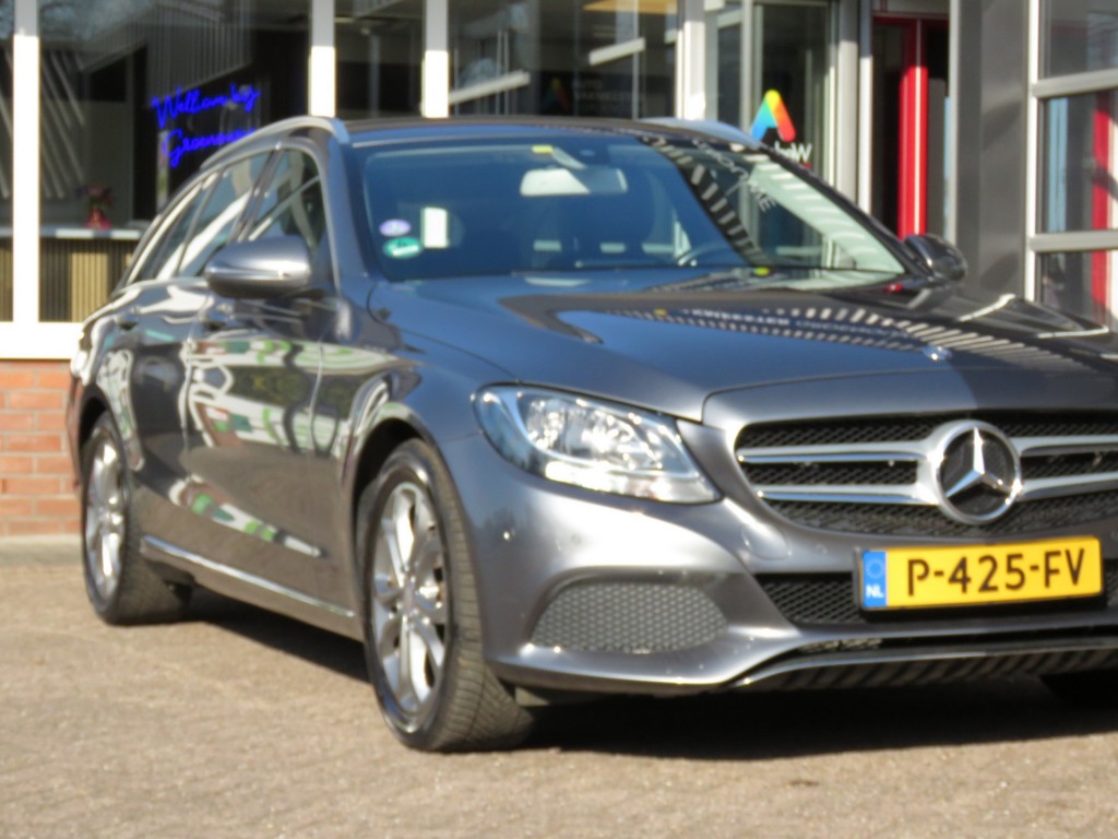 MERCEDES-BENZ-C-KLASSE-C180 156pk Aut. PRESTIGE / Camera / Leder-stof / Trekhaak / Veel