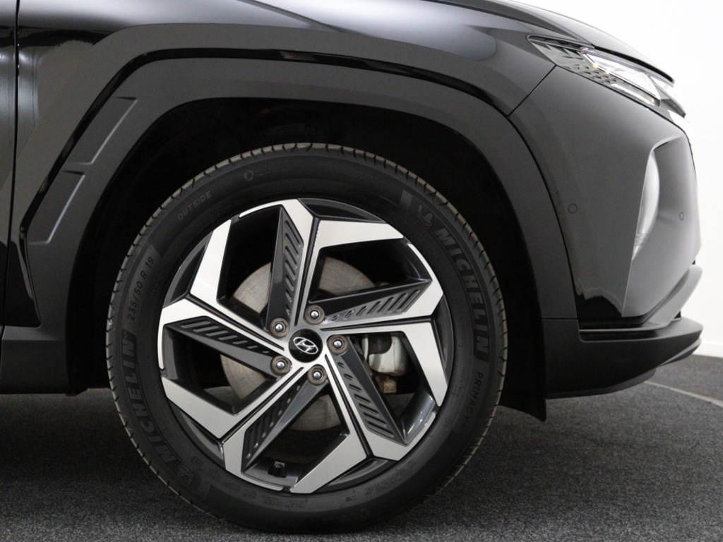 HYUNDAI-TUCSON-1.6 T-GDI PHEV Premium PLT vanaf ?699,- per maand 360 Camera