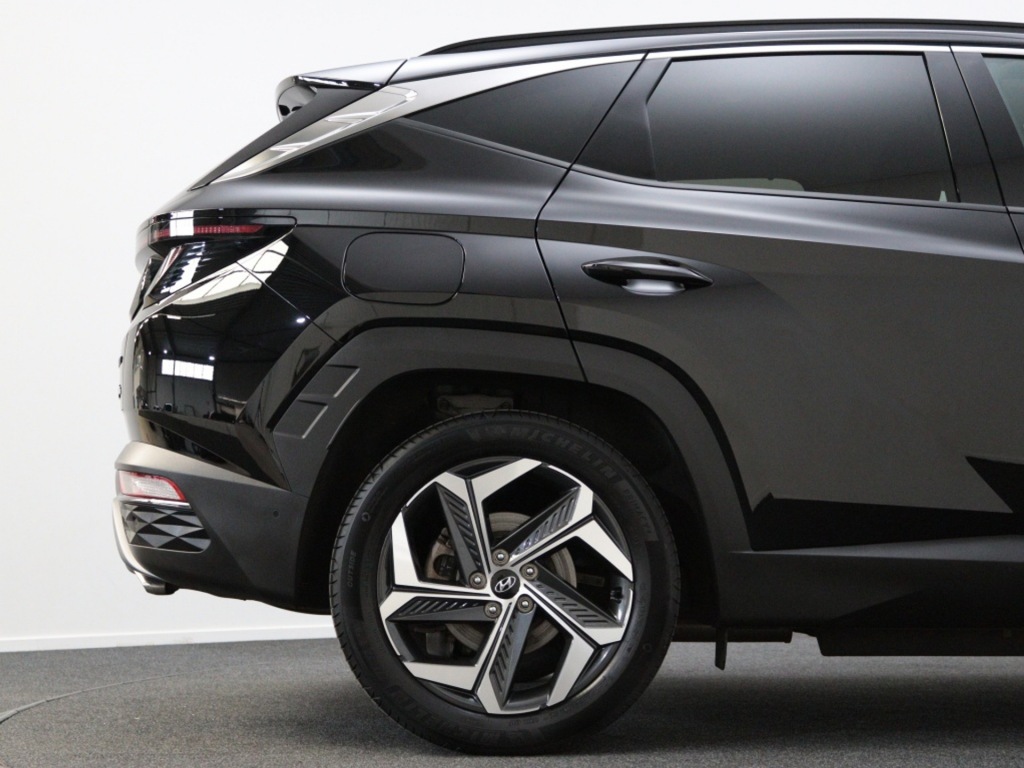 HYUNDAI-TUCSON-1.6 T-GDI PHEV Premium PLT vanaf ?699,- per maand 360 Camera
